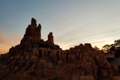 View of Big Thunder Mountain Railroad at Sunset from the Liberty Square Riverboat in Magic Kingdom