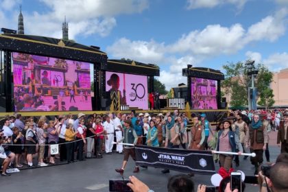 Disney Cast Members dressed in the new uniforms for Star Wars: Galaxy’s Edge walking in the 30th anniversary parade for Disney’s Hollywood Studios on May 1, 2019