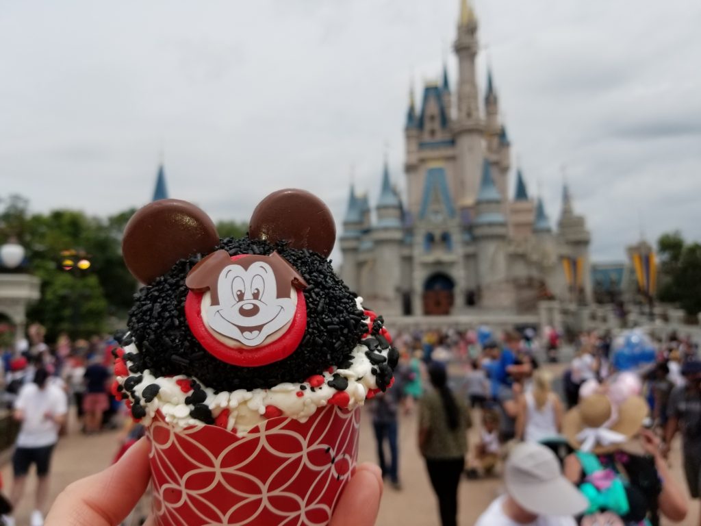 The Mouseketeer Cupcake in front of Cinderella Castle in Magic Kingdom