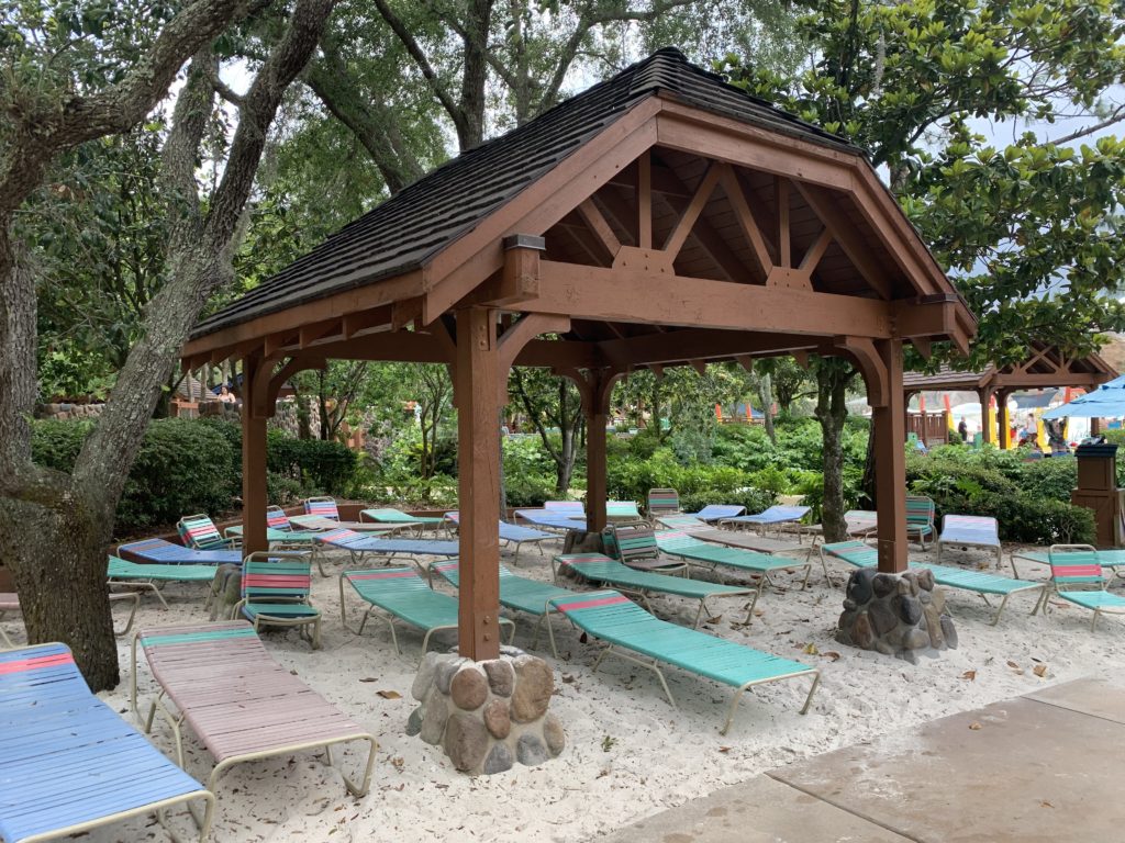 Lounge chairs under an awning at Blizzard Beach.  