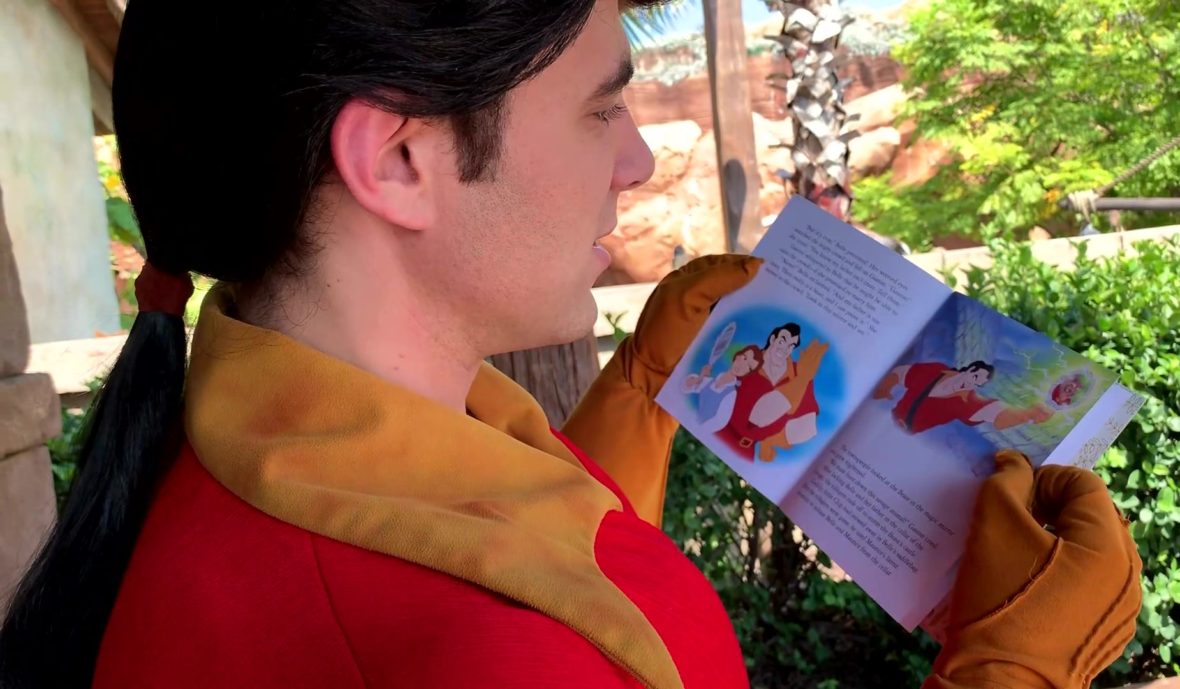 Meeting Gaston in Fantasyland in Magic Kingdom - Gaston With His Nose Stuck in a Book