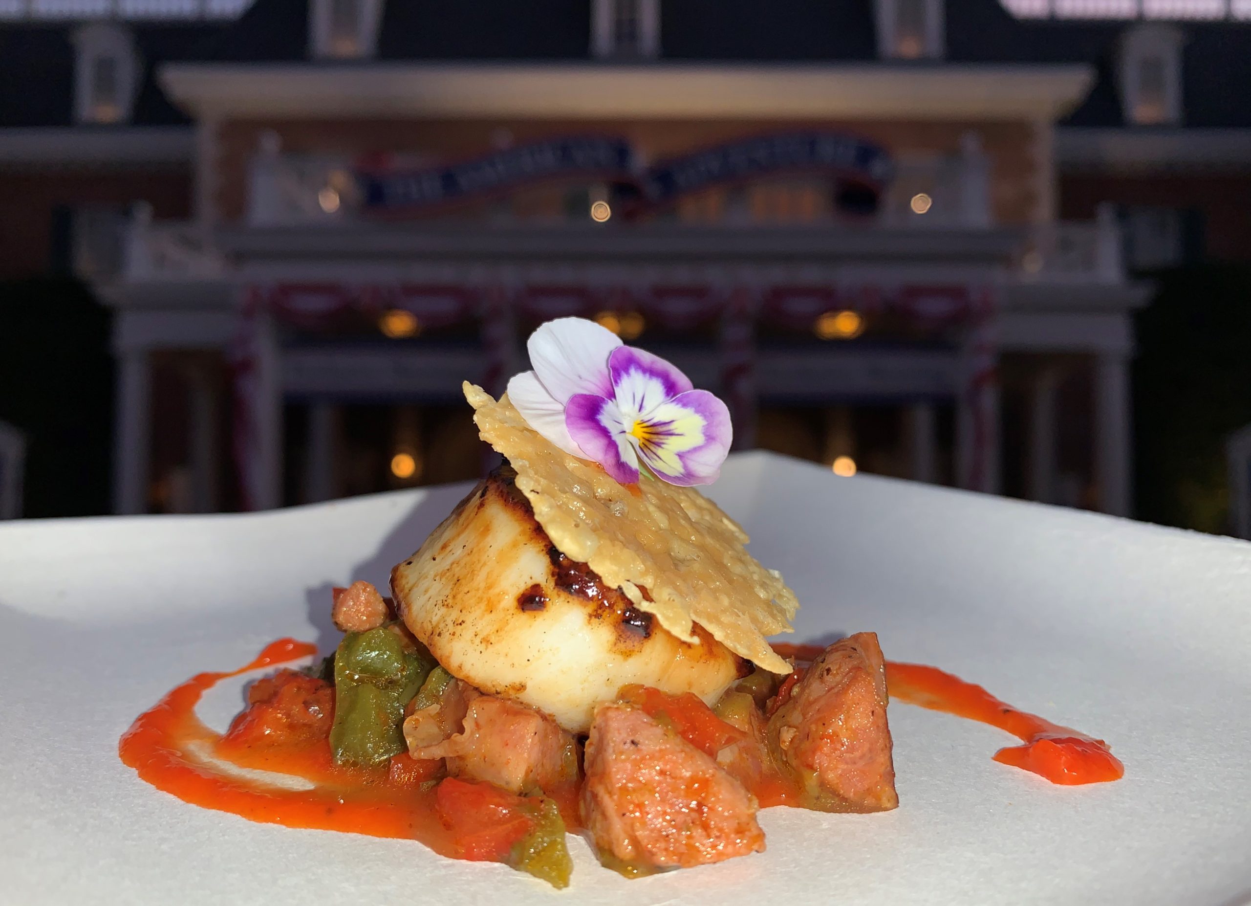 Pan-Seared Scallop with Chorizo, Roasted Red Pepper Coulis and a Parmesan Crisp from The Artist’s Table in America